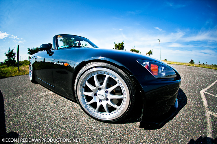 This is Chris' Slammed Honda S2000 It's got about an inch and a half of